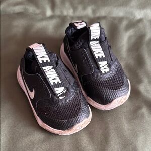 Nike Black and White Sneakers with Streamlined Design